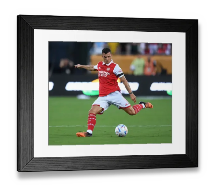 Framed Print : Granit Xhaka's Standout Performance: Arsenal vs. Chelsea in Florida Cup
