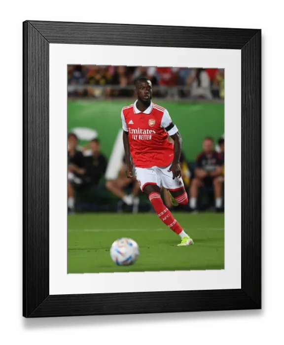 Framed Print : Arsenal's Nicolas Pepe Faces Off Against Chelsea in the 2022-23 Florida Cup Showdown