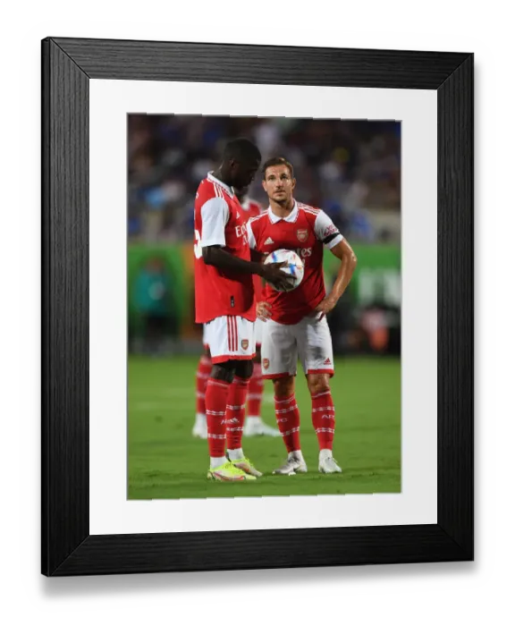 Framed Print : Arsenal's Pepe and Soares Face Off Against Chelsea in Florida Cup 2022-23