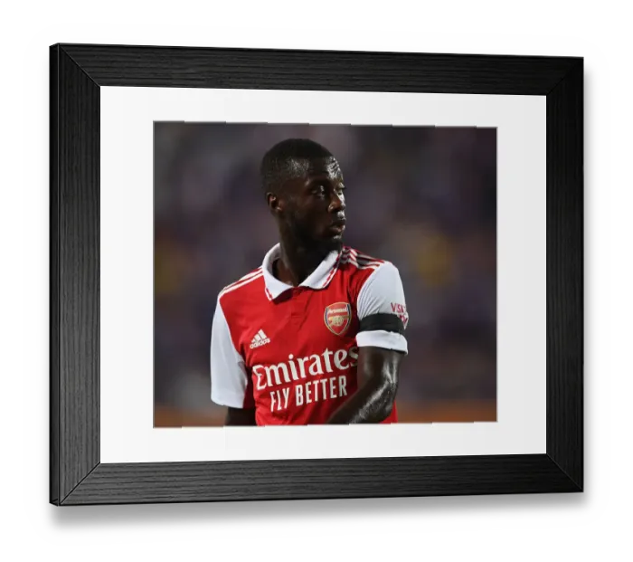 Framed Print : Arsenal's Nicolas Pepe Faces Off Against Chelsea in the 2022-23 Florida Cup