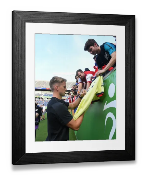 Framed Print : Arsenal's Rob Holding Interacts with Fans Before Arsenal vs. Chelsea - Florida Cup 2022-23 Framed Print : Arsenal's Rob Holding Interacts with Fans Before Arsenal vs. Chelsea - Florida Cup 2022-23