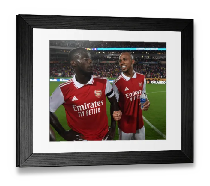 Framed Print : Arsenal's Pepe and Magalhaes Reunite After Facing Chelsea in Florida Cup Match Framed Print : Arsenal's Pepe and Magalhaes Reunite After Facing Chelsea in Florida Cup Match
