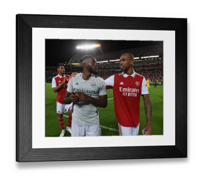 Framed Print : Arsenal's Nuno Tavares and Gabriel Magalhaes Reunite After Chelsea Clash in Florida Cup 2022-23