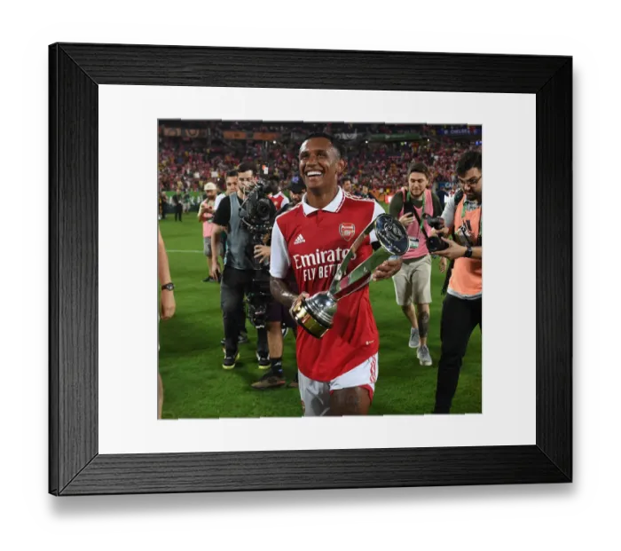 Framed Print : Arsenal Claims Victory in Florida Cup: Marquinhos Lifts the Trophy After Arsenal's Win Against Chelsea