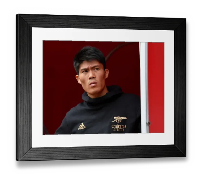 Framed Print : Arsenal's Takehiro Tomiyasu Gears Up for Arsenal v Sevilla Pre-Season Friendly Framed Print : Arsenal's Takehiro Tomiyasu Gears Up for Arsenal v Sevilla Pre-Season Friendly