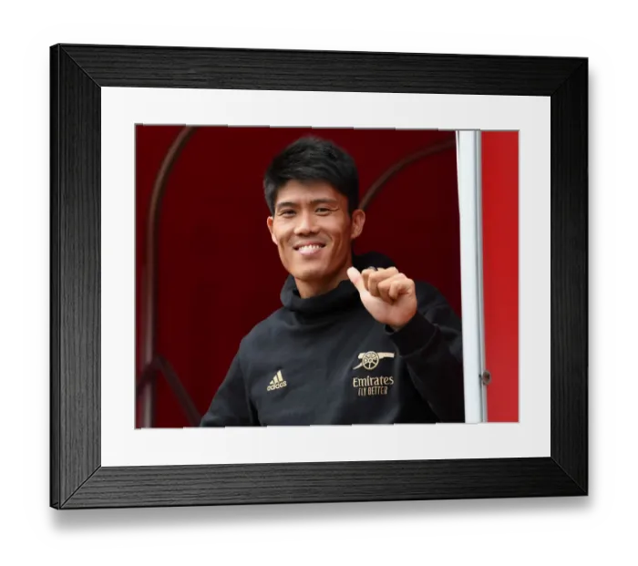 Framed Print : Arsenal's Tomiyasu Gears Up: Arsenal vs Sevilla - Emirates Cup 2022