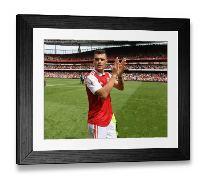 Framed Print : Arsenal's Granit Xhaka Celebrates with Fans after Arsenal v Sevilla Pre-Season Victory Framed Print : Arsenal's Granit Xhaka Celebrates with Fans after Arsenal v Sevilla Pre-Season Victory
