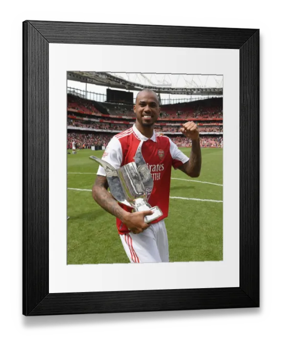 Framed Print : Arsenal's Gabriel Magalhaes Lifts Emirates Cup after Arsenal v Sevilla Friendly Framed Print : Arsenal's Gabriel Magalhaes Lifts Emirates Cup after Arsenal v Sevilla Friendly