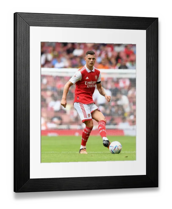 Framed Print : Granit Xhaka in Action: Arsenal vs Sevilla at the 2022 Emirates Cup Framed Print : Granit Xhaka in Action: Arsenal vs Sevilla at the 2022 Emirates Cup