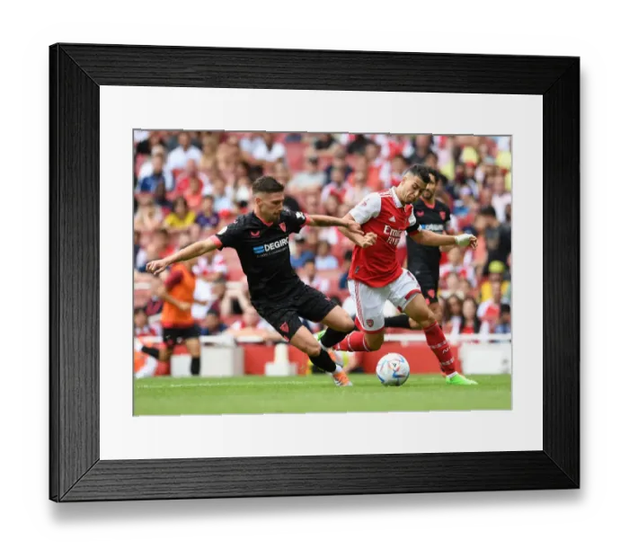 Framed Print : Arsenal vs Sevilla: Martinelli Takes on Jose Angel in Emirates Cup Clash (2022) Framed Print : Arsenal vs Sevilla: Martinelli Takes on Jose Angel in Emirates Cup Clash (2022)