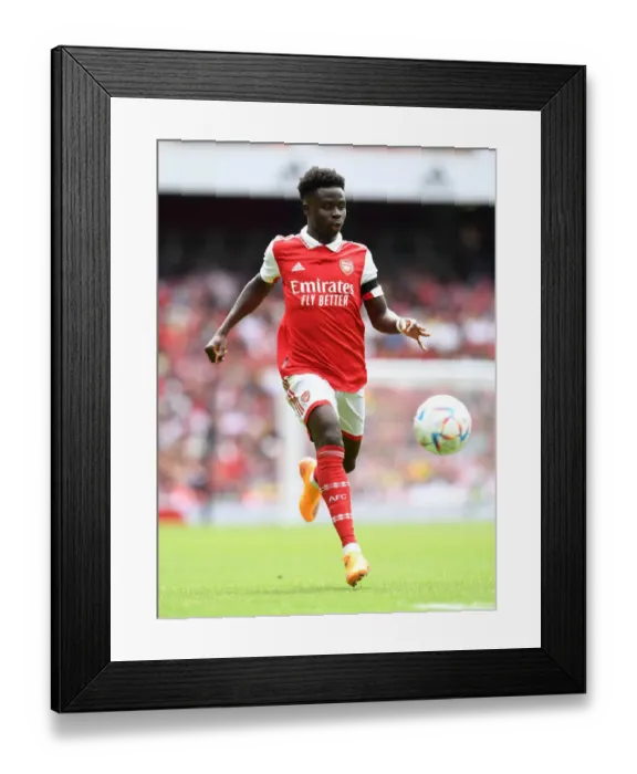 Framed Print : Arsenal's Bukayo Saka Shines in Emirates Cup Match against Sevilla