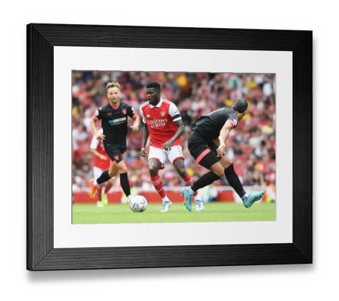 Framed Print : Arsenal's Thomas Partey Shines in Emirates Cup Clash Against Sevilla