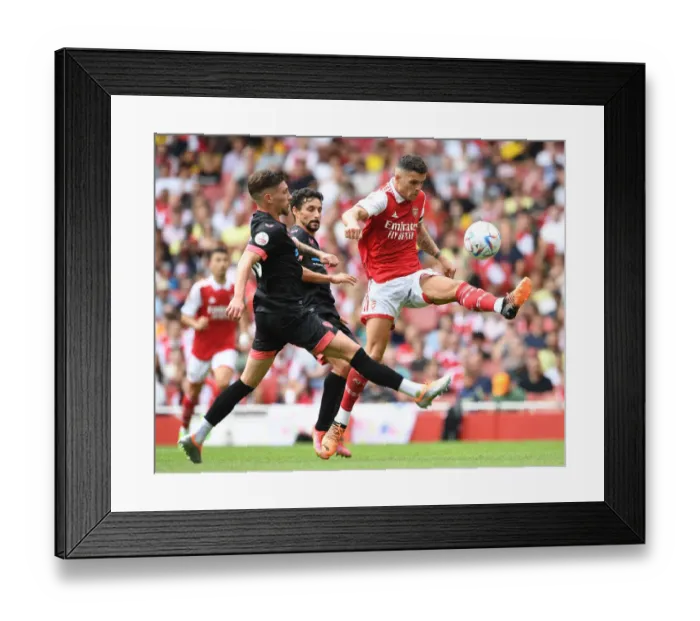 Framed Print : Granit Xhaka in Action: Arsenal vs Sevilla, Emirates Cup 2022