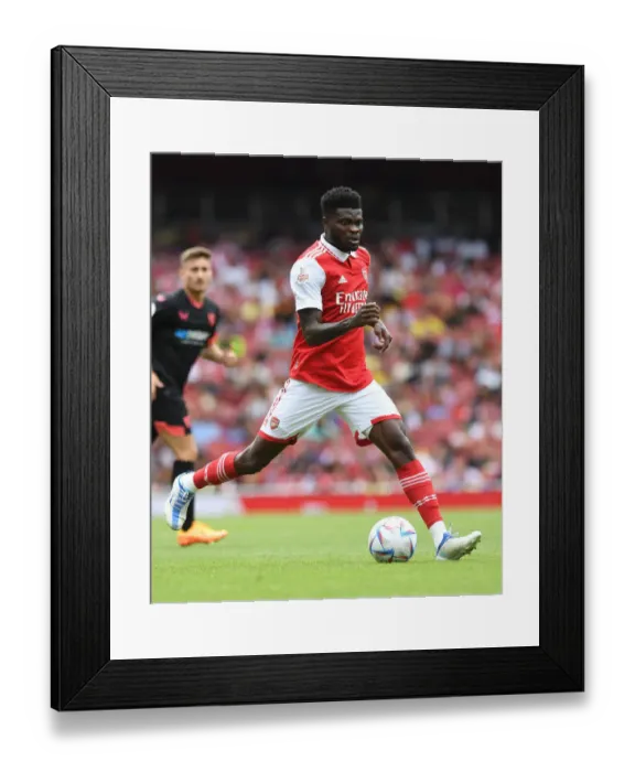 Framed Print : Thomas Partey in Action: Arsenal vs Sevilla - Emirates Cup 2022