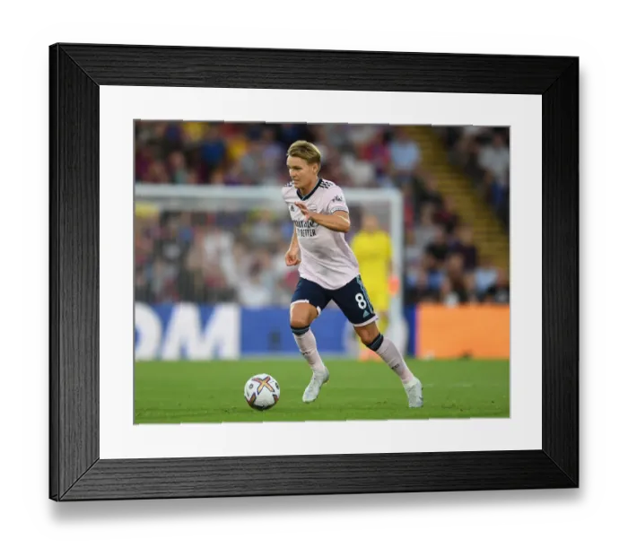 Framed Print : Arsenal's Martin Odegaard in Action: Battle Against Crystal Palace in 2022-23 Premier League