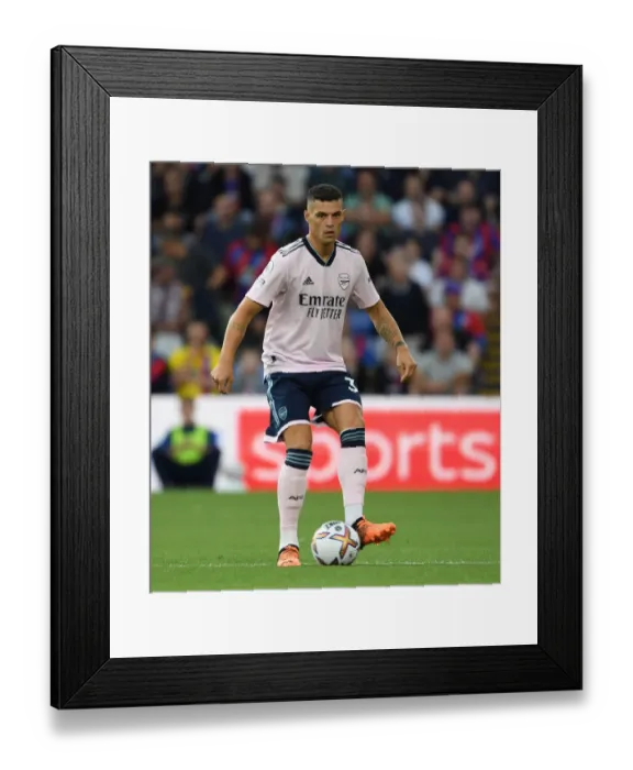 Framed Print : Granit Xhaka's Brilliant Midfield Performance: Arsenal Triumphs Over Crystal Palace (2022-23)