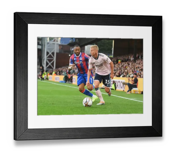 Framed Print : Arsenal's Oleksandr Zinchenko Outmaneuvers Crystal Palace's Jordan Ayew in Premier League Clash Framed Print : Arsenal's Oleksandr Zinchenko Outmaneuvers Crystal Palace's Jordan Ayew in Premier League Clash