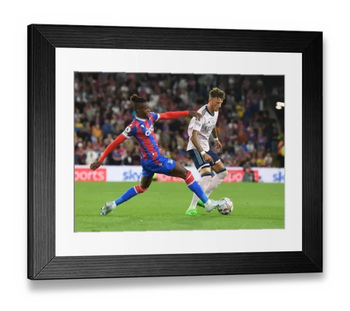 Framed Print : Arsenal's Ben White Outmaneuvers Crystal Palace's Wilfred Zaha in Premier League Clash Framed Print : Arsenal's Ben White Outmaneuvers Crystal Palace's Wilfred Zaha in Premier League Clash
