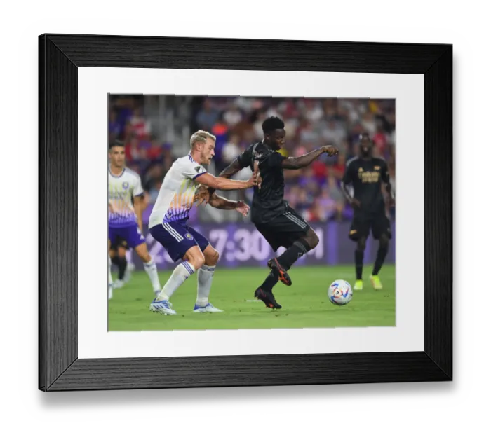Framed Print : Arsenal's Eddie Nketiah Shines in Pre-Season Clash Against Orlando City SC Framed Print : Arsenal's Eddie Nketiah Shines in Pre-Season Clash Against Orlando City SC