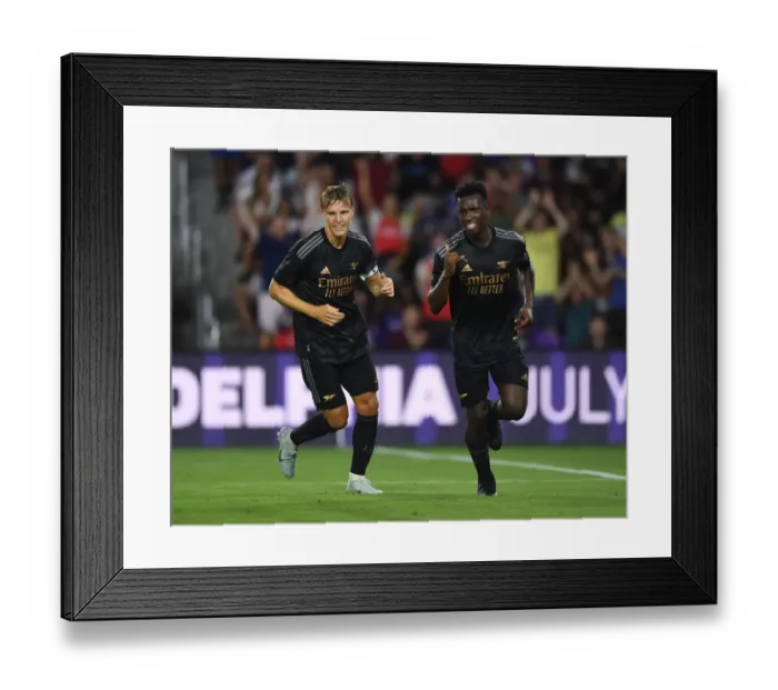 Framed Print : Arsenal's Eddie Nketiah and Martin Odegaard Celebrate Goals in Pre-Season Victory Over Orlando City SC