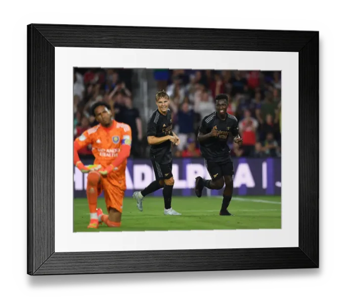 Framed Print : Arsenal's Nketiah and Odegaard Celebrate Goals in Pre-Season Win Framed Print : Arsenal's Nketiah and Odegaard Celebrate Goals in Pre-Season Win