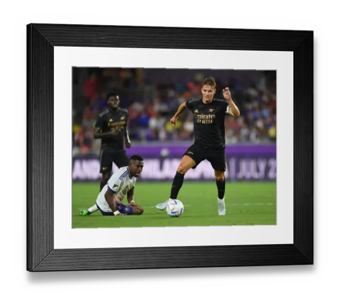 Framed Print : Martin Odegaard in Pre-Season Action: Arsenal vs Orlando City SC at Exploria Stadium
