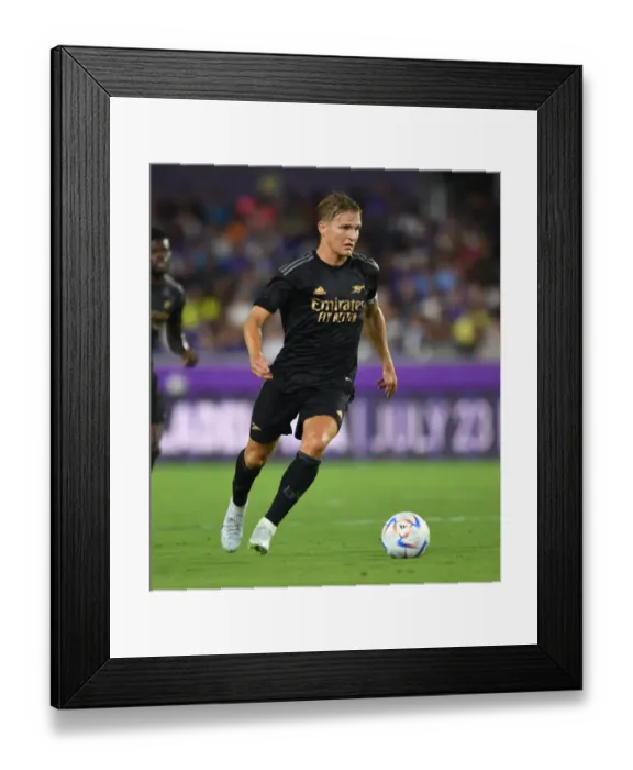 Framed Print : Arsenal's Martin Odegaard in Pre-Season Action against Orlando City SC Framed Print : Arsenal's Martin Odegaard in Pre-Season Action against Orlando City SC