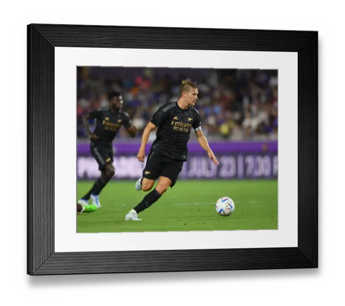 Framed Print : Martin Odegaard in Action: Arsenal's Pre-Season Battle at Orlando City SC (2022-23)