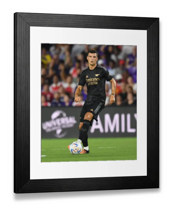 Framed Print : Granit Xhaka in Action: Arsenal's Pre-Season Battle at Orlando City SC
