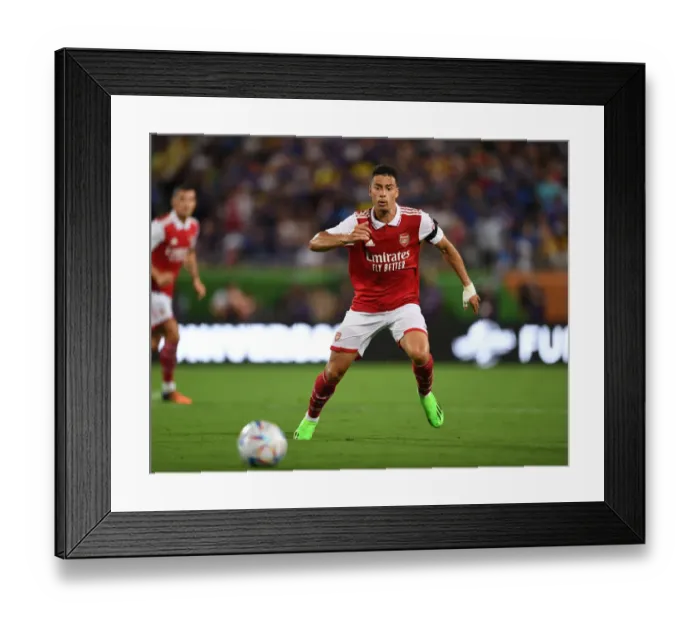 Framed Print : Arsenal's Gabriel Martinelli Goes Head-to-Head Against Chelsea in the 2022-23 Florida Cup