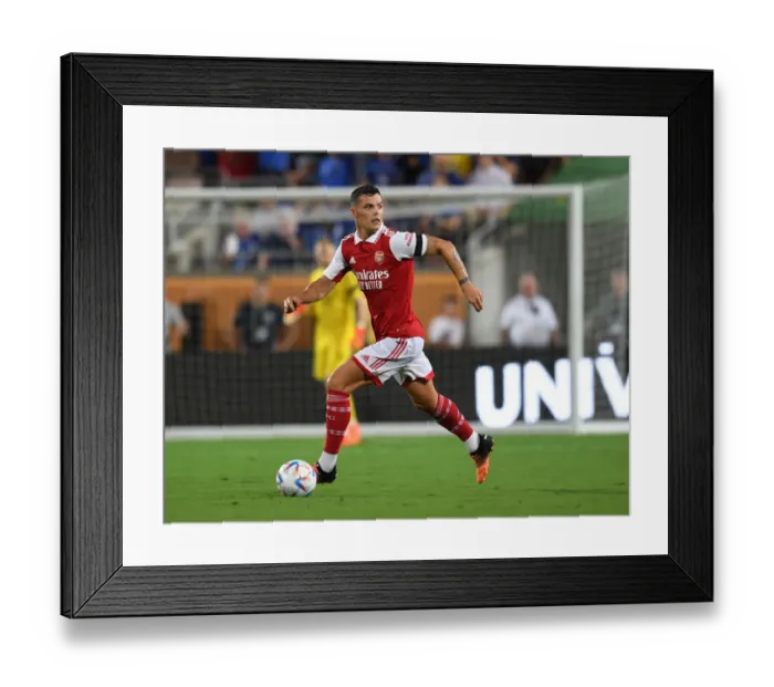 Framed Print : Arsenal's Granit Xhaka in Action Against Chelsea in the Florida Cup 2022-23 Framed Print : Arsenal's Granit Xhaka in Action Against Chelsea in the Florida Cup 2022-23