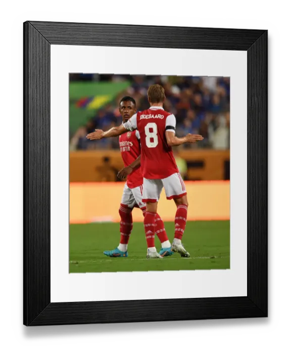 Framed Print : Arsenal's Marquinhos and Odegaard Face Off Against Chelsea in Florida Cup