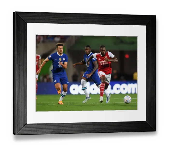 Framed Print : Arsenal's Nuno Tavares Outsmarts Chelsea's Ethan Ampadu in Florida Cup Showdown: A Tactical Masterclass
