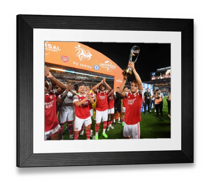 Framed Print : Arsenal Lift the Florida Cup: Martin Odegaard Celebrates Victory Over Chelsea Framed Print : Arsenal Lift the Florida Cup: Martin Odegaard Celebrates Victory Over Chelsea