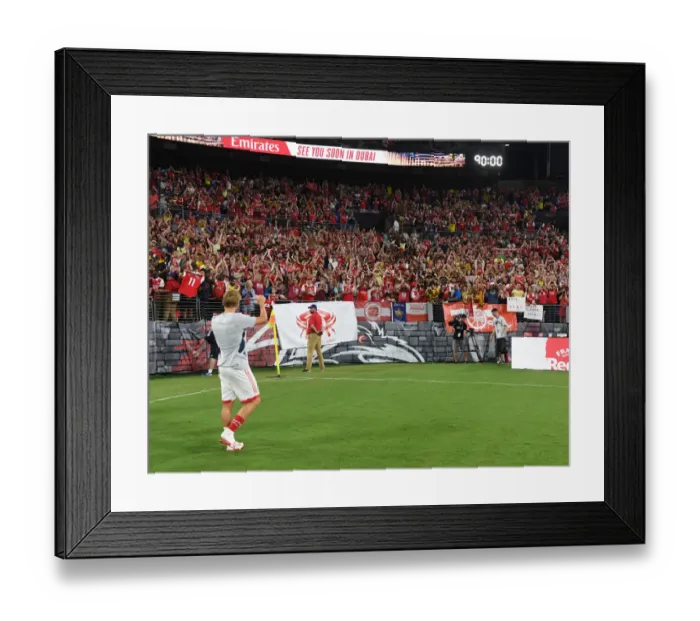 Framed Print : Arsenal's Martin Odegaard Celebrates with Fans after Pre-Season Victory over Everton Framed Print : Arsenal's Martin Odegaard Celebrates with Fans after Pre-Season Victory over Everton