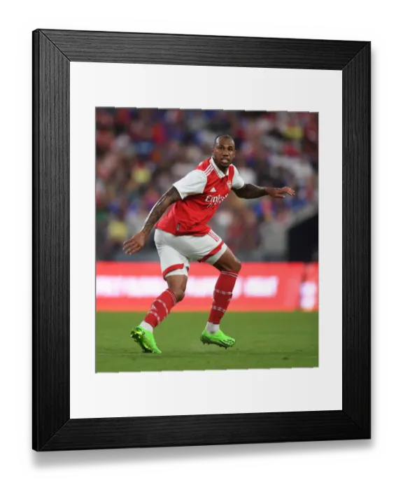 Framed Print : Arsenal's Gabriel Faces Off Against Everton in Pre-Season Friendly