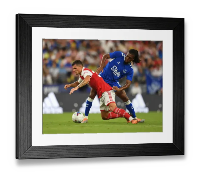 Framed Print : Arsenal vs. Everton: Granit Xhaka Fouls Alex Iwobi in Pre-Season Clash Framed Print : Arsenal vs. Everton: Granit Xhaka Fouls Alex Iwobi in Pre-Season Clash