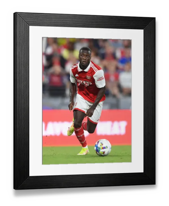 Framed Print : Arsenal's Nicolas Pepe in Action against Everton during Pre-Season Friendly (2022-23)