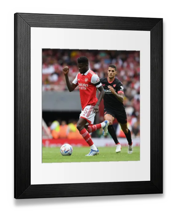 Framed Print : Thomas Partey's Star Performance: Arsenal's Victory Over Sevilla in Emirates Cup Framed Print : Thomas Partey's Star Performance: Arsenal's Victory Over Sevilla in Emirates Cup