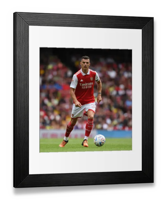 Framed Print : Granit Xhaka: Arsenal's Midfield Maestro Shines in Emirates Cup Match against Sevilla