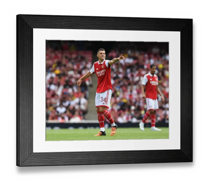 Framed Print : Granit Xhaka in Action: Arsenal vs Sevilla at the 2022 Emirates Cup