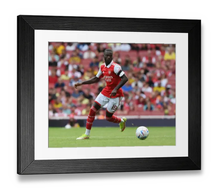 Framed Print : Arsenal's Nicolas Pepe Shines in Emirates Cup Clash Against Sevilla Framed Print : Arsenal's Nicolas Pepe Shines in Emirates Cup Clash Against Sevilla