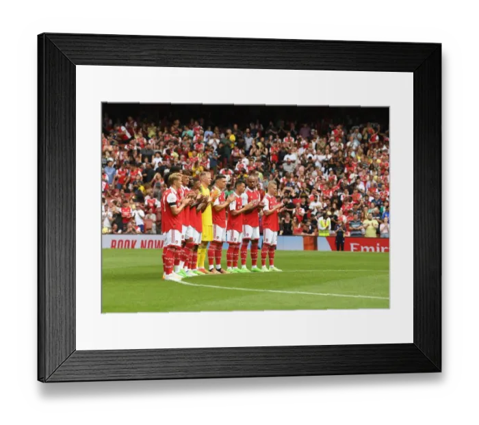 Framed Print : Arsenal Honors Late Terry Neill with Minutes Applause against Sevilla Framed Print : Arsenal Honors Late Terry Neill with Minutes Applause against Sevilla
