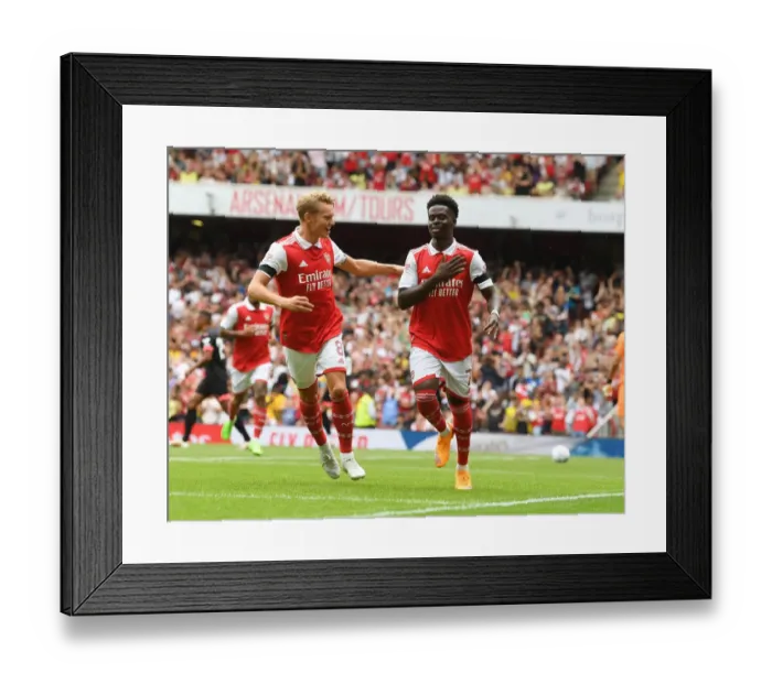 Framed Print : Saka and Odegaard: Arsenal's Dynamic Duo Celebrate First Goal at Emirates Cup 2022