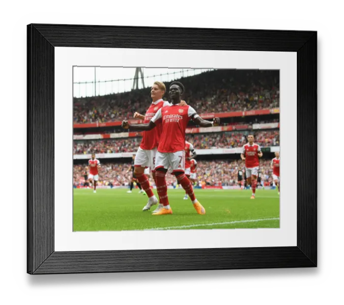 Framed Print : Arsenal: Saka and Odegaard Celebrate First Goals in Emirates Cup Victory Framed Print : Arsenal: Saka and Odegaard Celebrate First Goals in Emirates Cup Victory