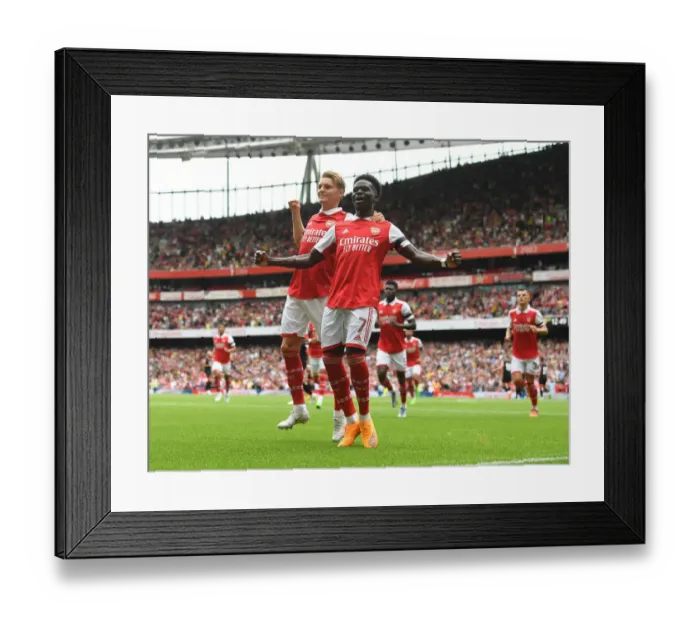 Framed Print : Saka and Odegaard Celebrate First Goals: Arsenal's Win Against Sevilla in Emirates Cup