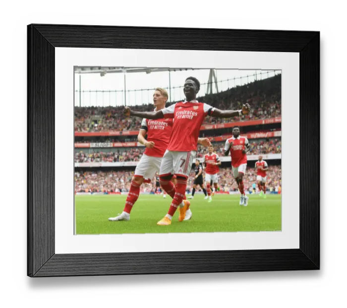 Framed Print : Arsenal: Saka and Odegaard's First Goal Celebration in Emirates Cup Victory over Sevilla (2022)