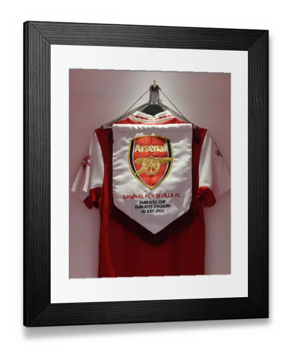 Framed Print : Arsenal FC: Pre-Season Friendly vs Sevilla - Emirates Cup 2022: Match Pennant in Changing Room