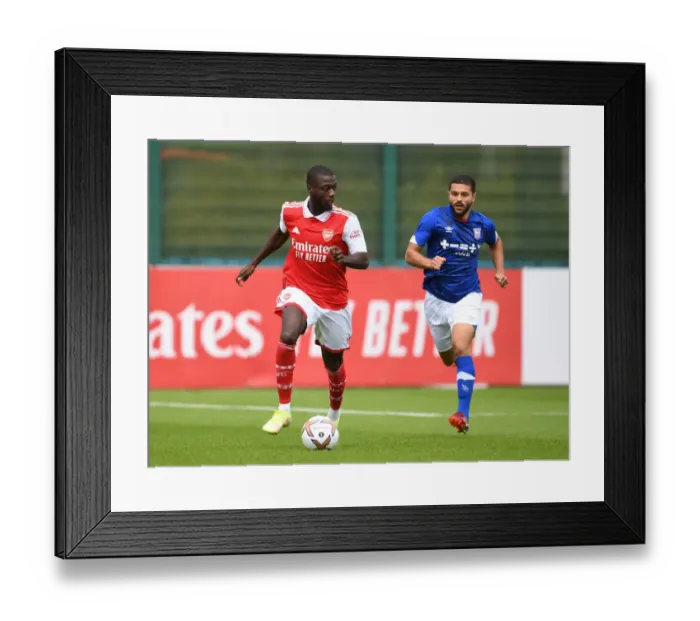 Framed Print : Arsenal's Nicolas Pepe in Action: Arsenal vs Ipswich Town (July 2022) - Pre-Season Friendly Framed Print : Arsenal's Nicolas Pepe in Action: Arsenal vs Ipswich Town (July 2022) - Pre-Season Friendly