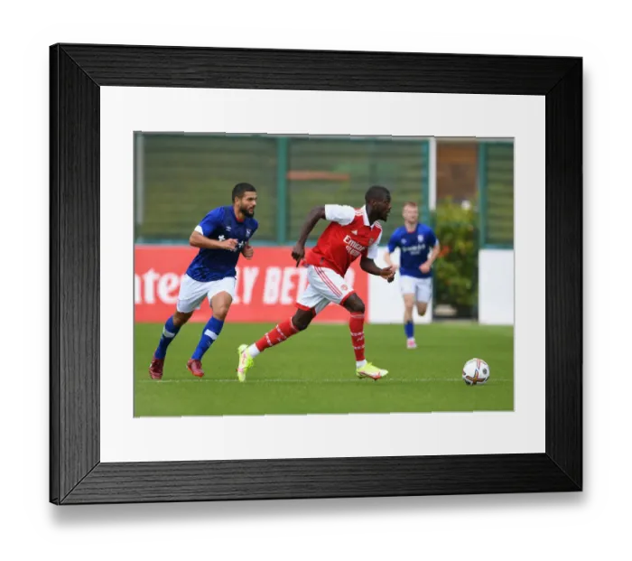 Framed Print : Arsenal's Nicolas Pepe Steals the Show in Arsenal's Pre-Season Victory over Ipswich Town (July 2022) Framed Print : Arsenal's Nicolas Pepe Steals the Show in Arsenal's Pre-Season Victory over Ipswich Town (July 2022)